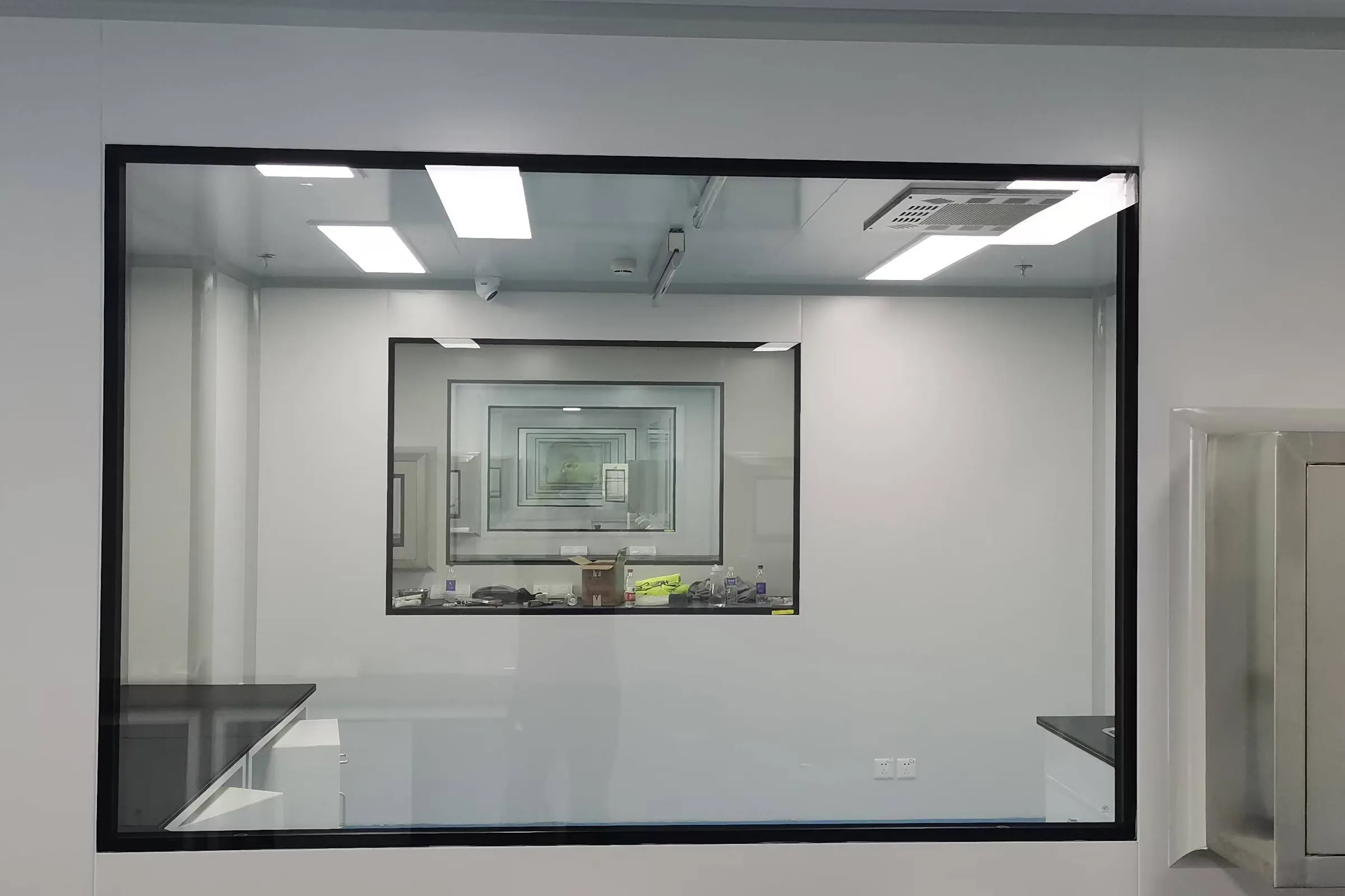Quality control laboratory seen through a viewing window